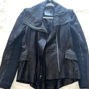 Used genuine, leather black leather jacket in excellent condition
